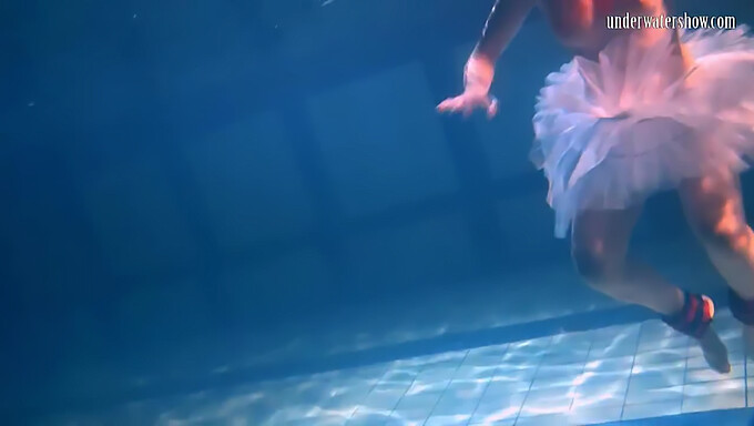 Bikini-Clad Bulava Lozhkova Poses Underwater In A Red Skirt And Tie