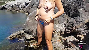 Amateur German Milf Swims Naked At Public Beach With Extreme Piercings