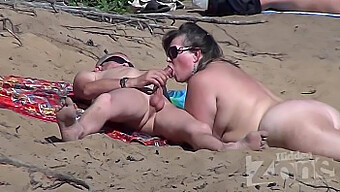 Amateur Nudist Receives A Blowjob On The Beach