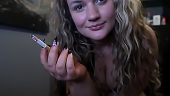 Wet And Wild: Busty Amateur Smokes And Teases In A Tiny Dress